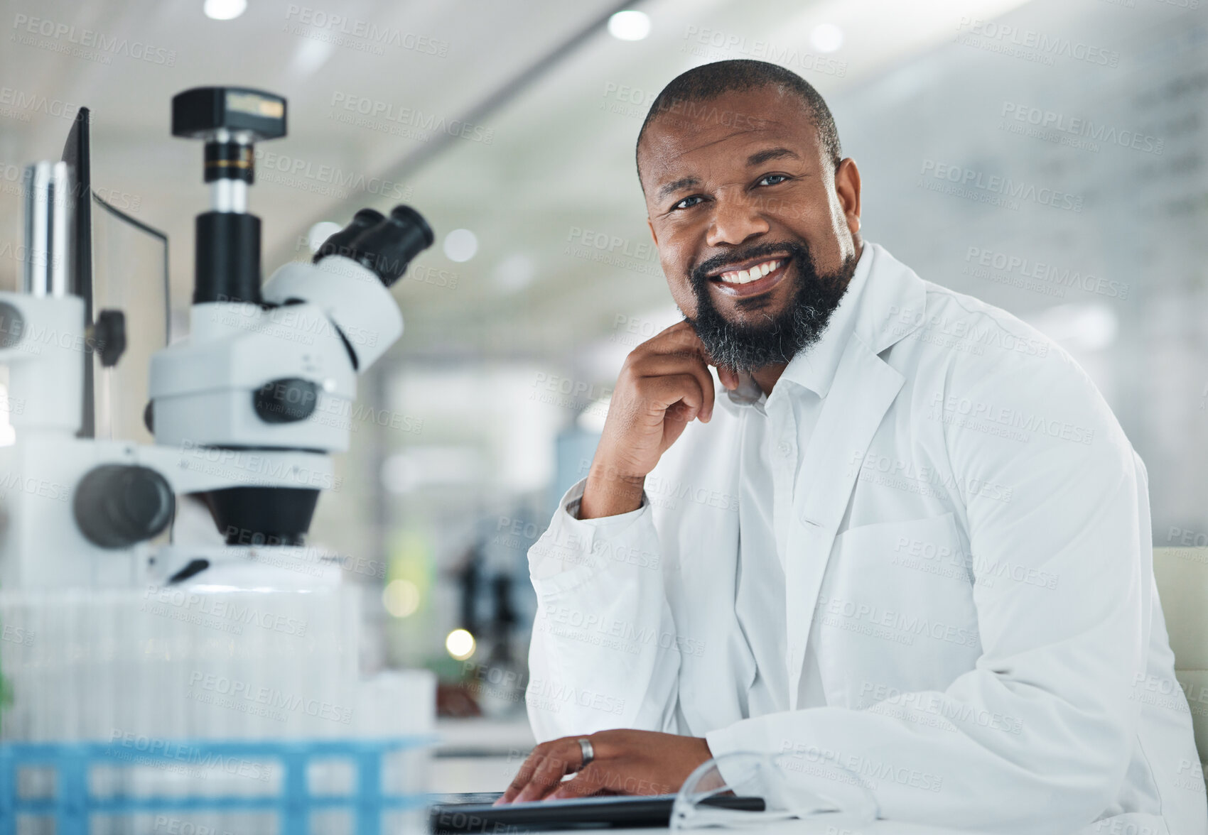 Buy stock photo Portrait, science or black man in lab for research, pathology experiment or confidence for cure study. Microscope, smile or mature scientist with pride for drug testing, pharma or medical innovation