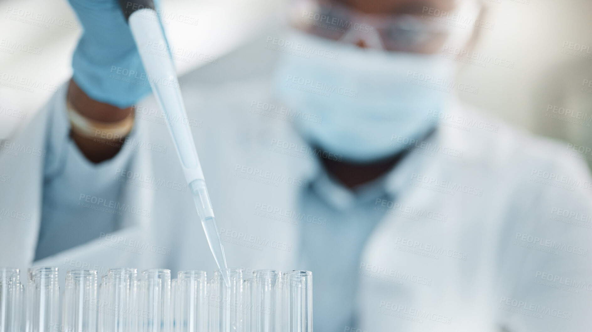 Buy stock photo Shot of a young scientist working with samples in a lab