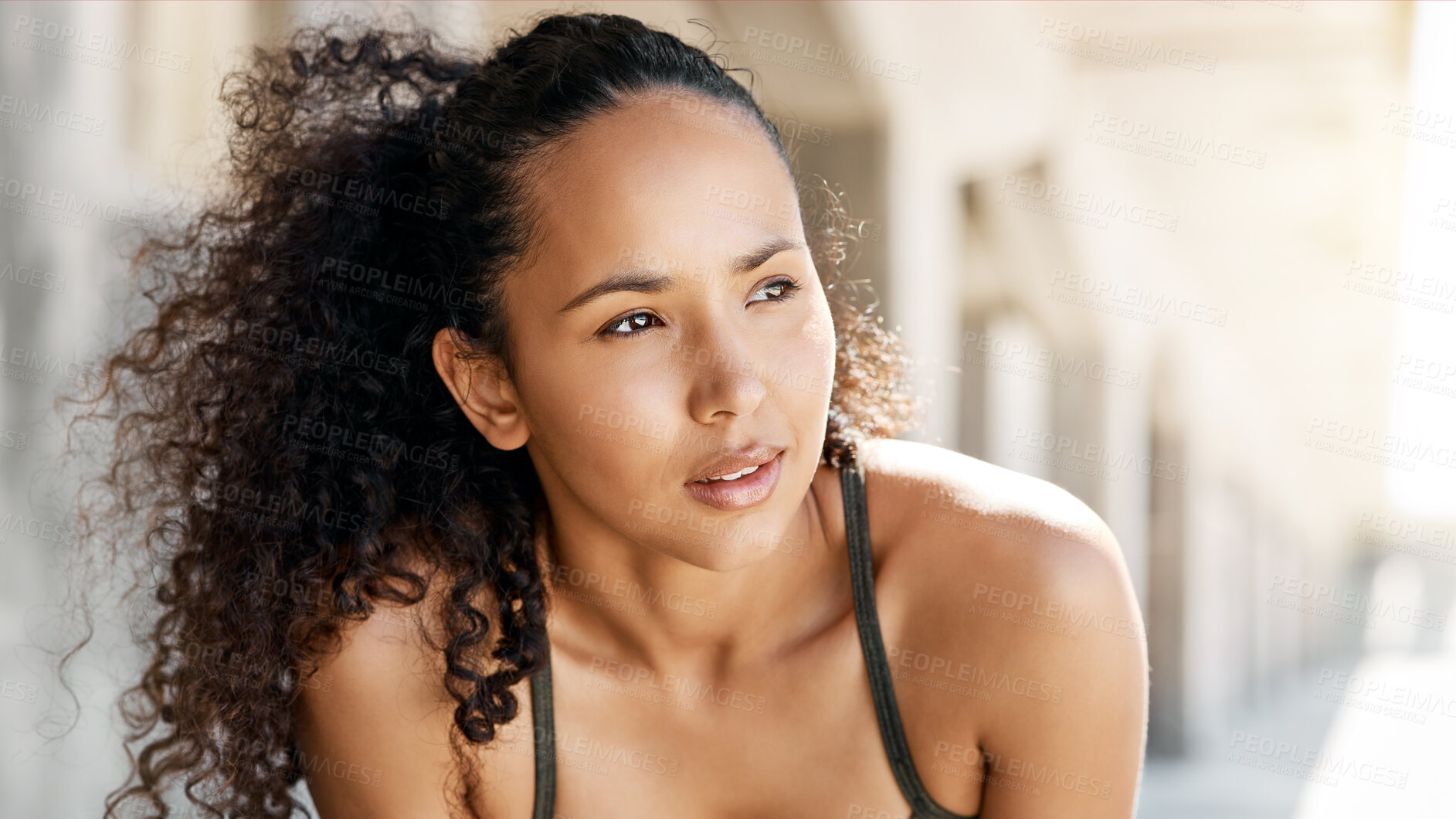 Buy stock photo Shot of an attractive young woman taking a moment to catch her breath during her outdoor workout