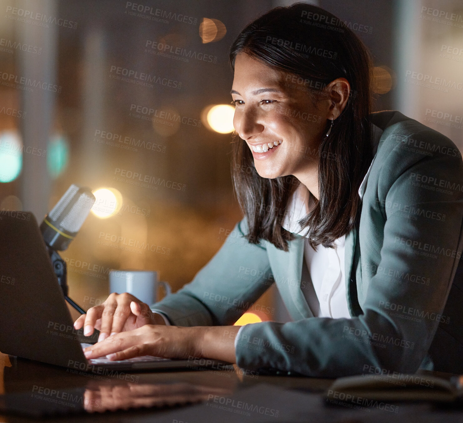 Buy stock photo Cropped shot of an attractive young businesswoman working late at her company offices