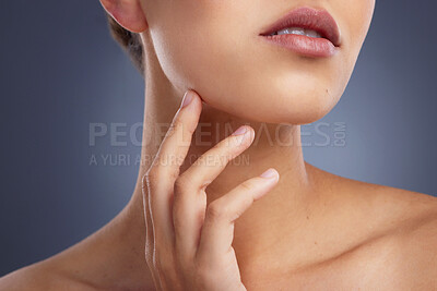 Buy stock photo Closeup shot of a woman touching her face