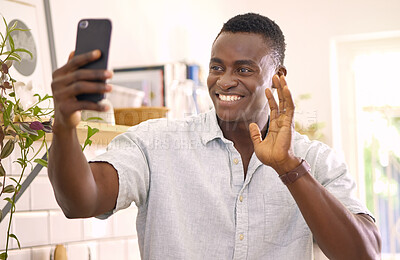Buy stock photo Shot of a young man on a video call at home