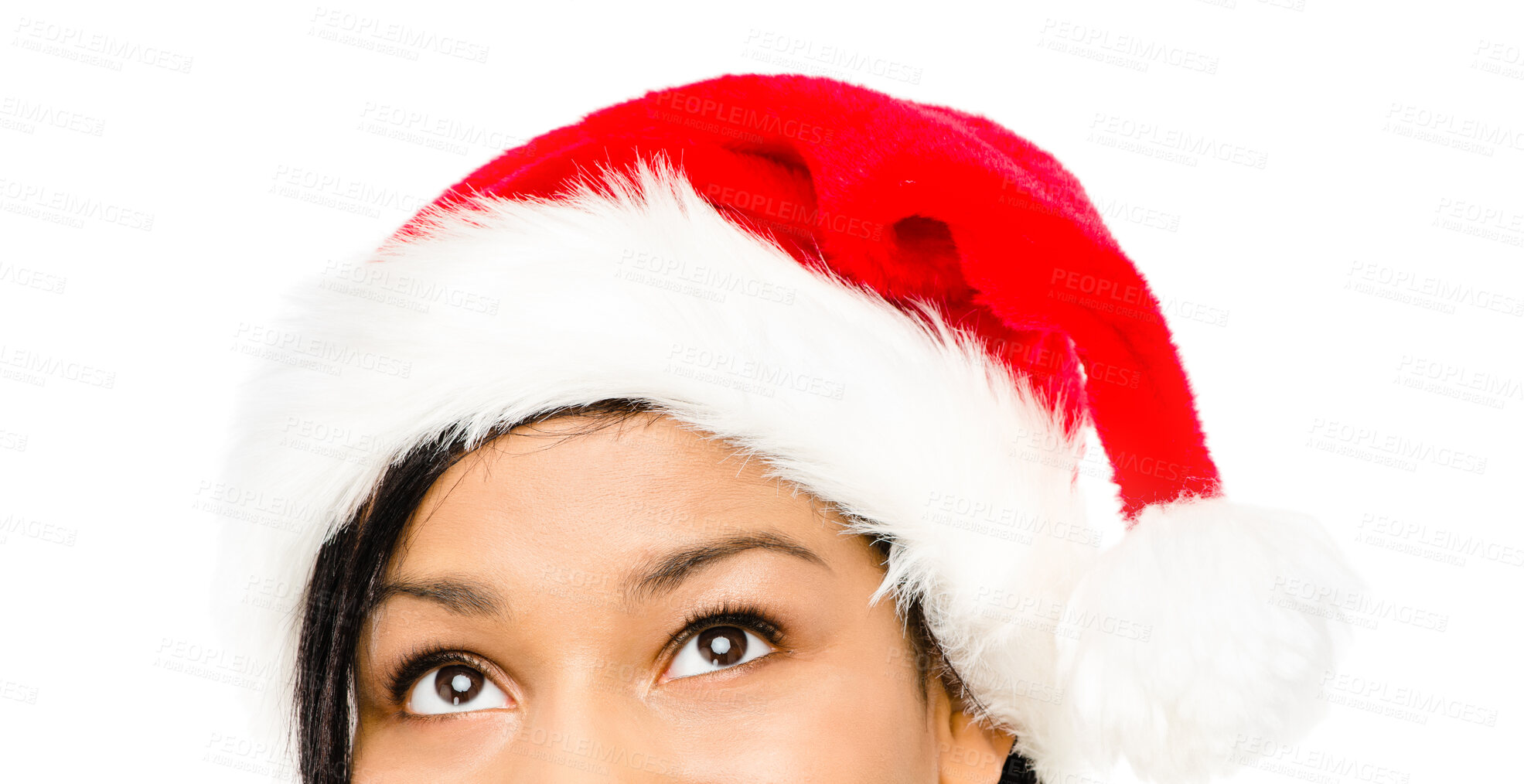 Buy stock photo Shot of a young businesswoman in a christmas hat against a studio background