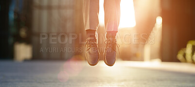 Buy stock photo Feet, shoes and jumping in air outdoor for celebration, success and achievement with lens flare. Business person, foot and legs in closeup outside for victory, hopping and good news as prize winner