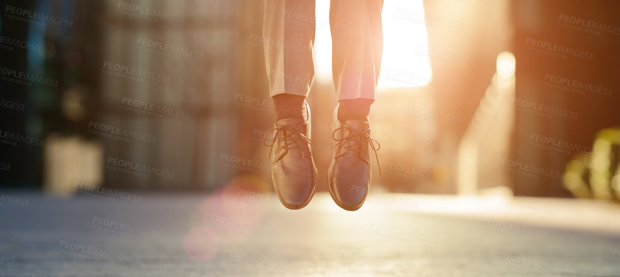 Buy stock photo Feet, shoes and jumping in air outdoor for celebration, success and achievement with lens flare. Business person, foot and legs in closeup outside for victory, hopping and good news as prize winner