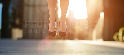 Buy stock photo Shot of a businesswoman jumping in the air