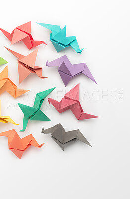 Buy stock photo Art, studio and group with origami bird for handmade, creative design and geometric decoration. Japanese, craft and shape with animal bunch on white background for object, sculpture and folded figure