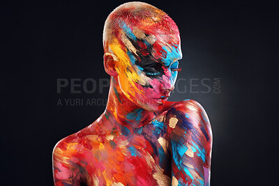 Buy stock photo Shot of an attractive young woman posing alone in the studio with paint on her face and body