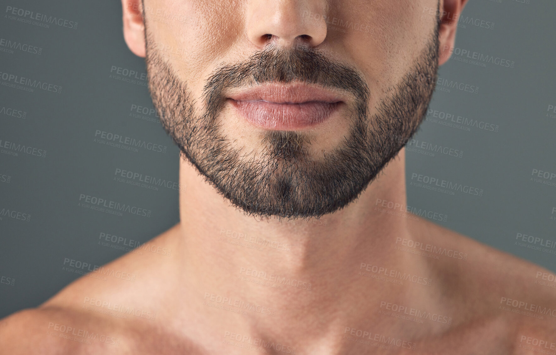 Buy stock photo Closeup shot of a man's face against a grey background