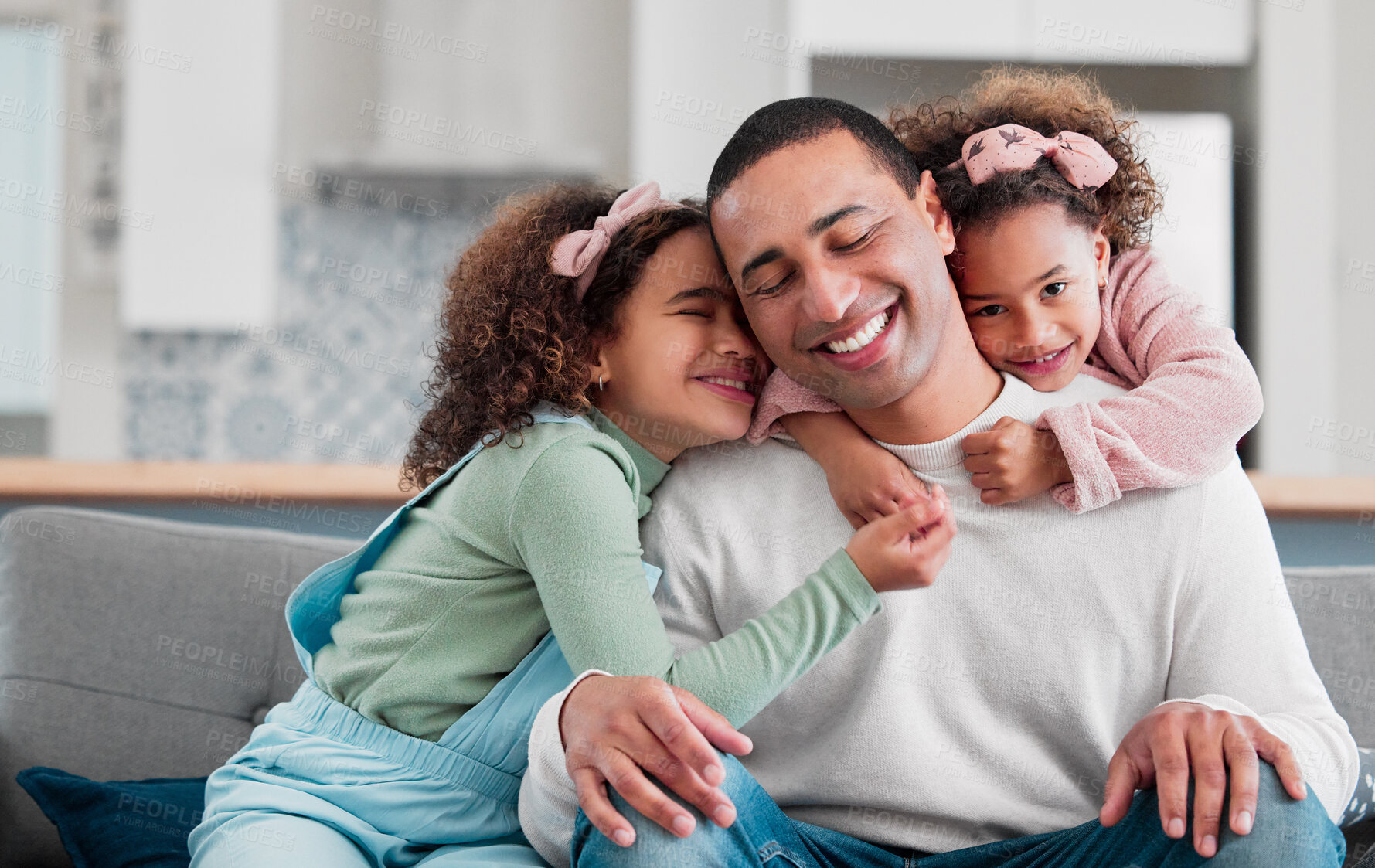 Buy stock photo Sofa, happy and dad with children hug for bonding, loving relationship and relax together in home. Family, fatherhood and father with girls in living room for affection, embrace and smile for love