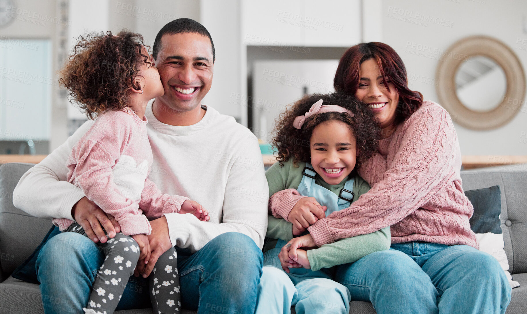 Buy stock photo Happy family, portrait and hug with children on sofa for bonding, love and care together at home. Father, mother and young kids or sisters with smile in joy for childhood, support or growth at house