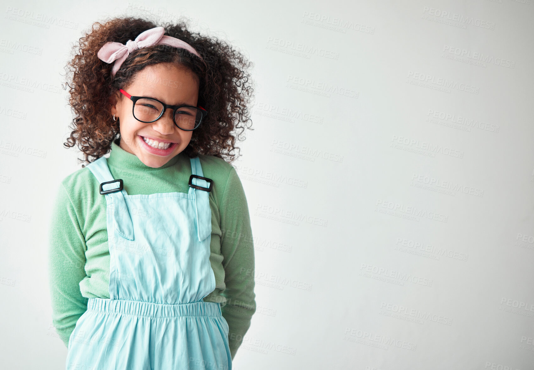 Buy stock photo Happy, glasses and portrait of child in studio with mockup space for prize, deal or giveaway. Shy, smile and cute girl kid from Mexico with promotion, winner or vision isolated by white background.