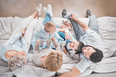 Buy stock photo Big family, love and relax on sofa together for quality time, fun and happiness. Top view, happy parents and grandmother with children for care, support bonding and talking on couch in family home