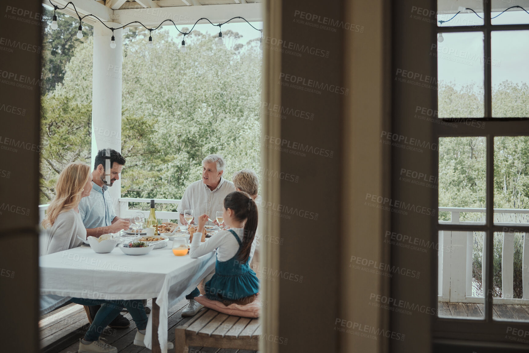 Buy stock photo Shot of a family having lunch at home