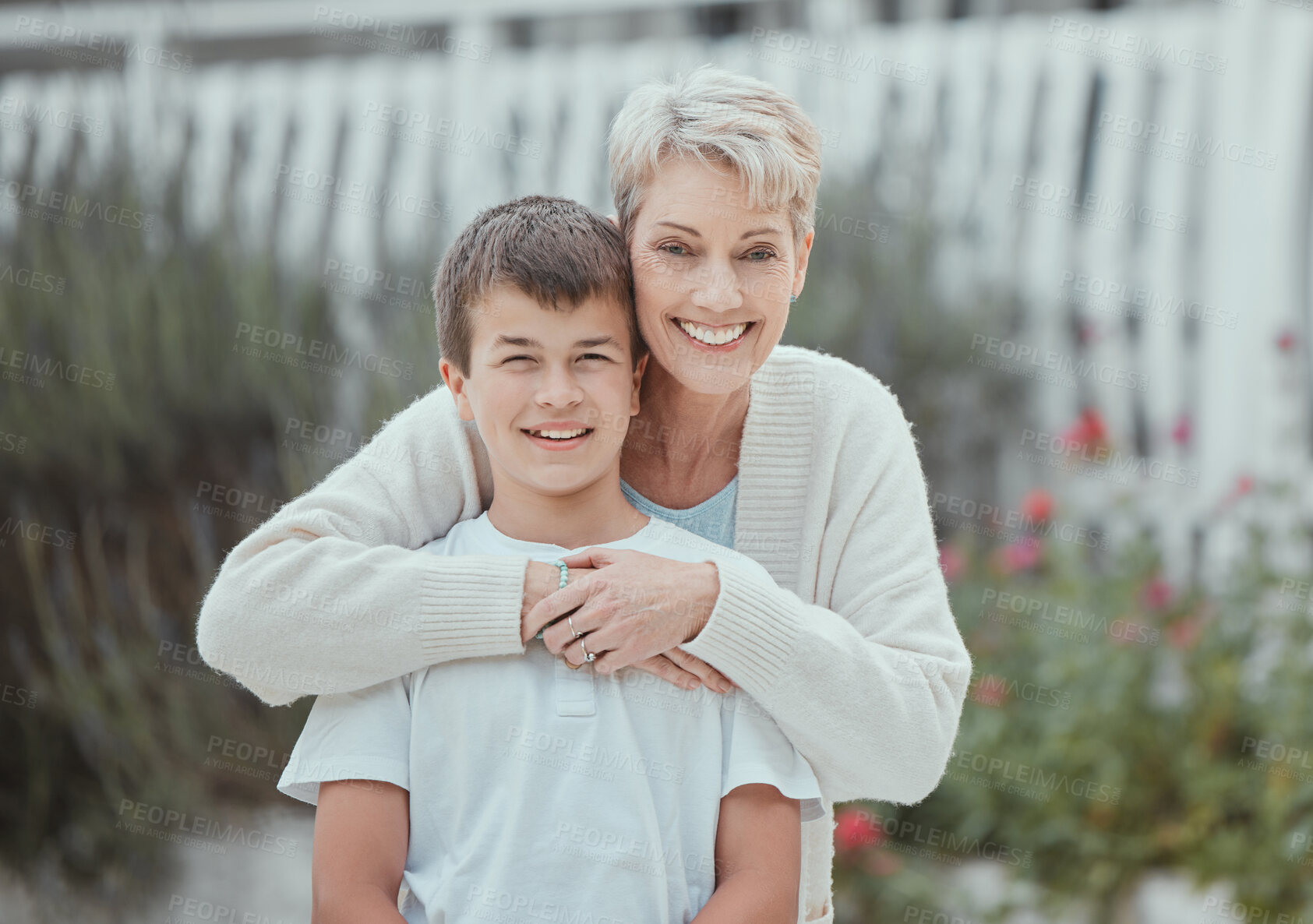 Buy stock photo Hug, portrait and smile of grandmother with son in garden of new home together for property investment. Growth, love or support with senior woman and boy child outdoor for real estate development