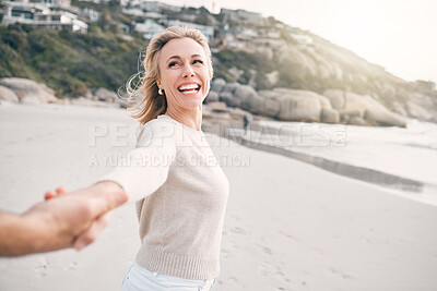 Buy stock photo Holding hands, beach and couple with smile, closeup and romance with happiness, adventure and care. People, seaside and man with woman, ocean and dating with love, cheerful and bonding together