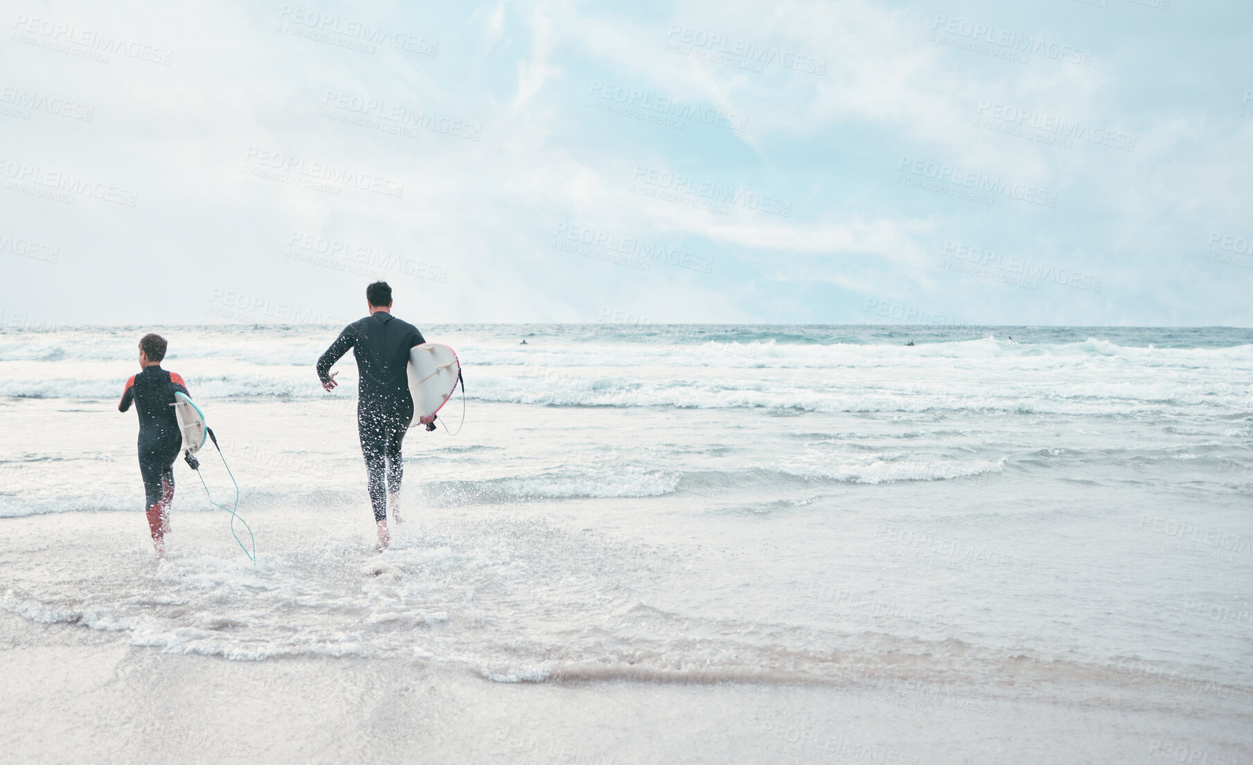 Buy stock photo Surfboard, dad or boy at sea for running, sports or exercise for fitness or bonding adventure. Back, father and kid surfer at beach for surfing, teaching or learning together for training or support