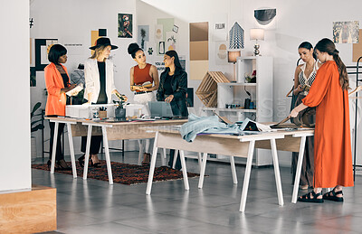 Buy stock photo Shot of a group of designers collaborating at a workshop together