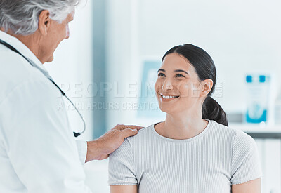 Buy stock photo Shot of a male doctor greeting his patient