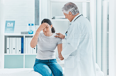 Buy stock photo Shot of a doctor offering a patient kind support after giving her bad news