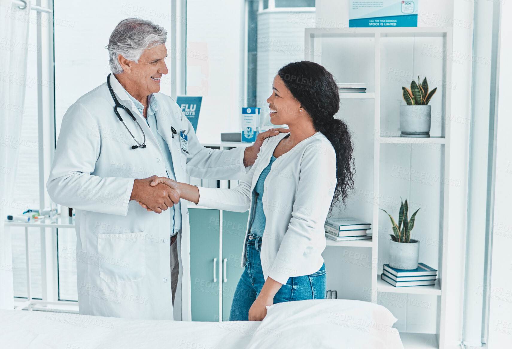 Buy stock photo Doctor, woman and handshake in office for welcome, greeting and friendly service in healthcare. Mature gynecologist, patient and gesture in practice for trust, consultation and assurance in clinic