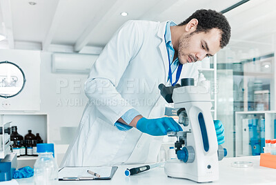 Buy stock photo Scientist, man and microscope in lab with analysis of glass plate for vaccine sample and medical research. Investigation, science professional and chemistry experiment for cancer cure and innovation