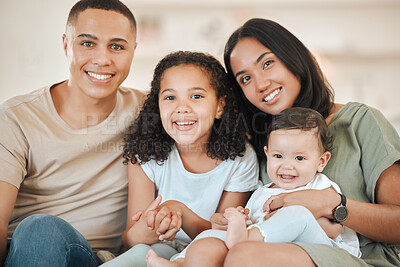 Buy stock photo Happy, portrait and parents with baby and kid in home for bonding, connection or family time. Smile, love and young mother and father holding infant with girl child sibling in living room at house.