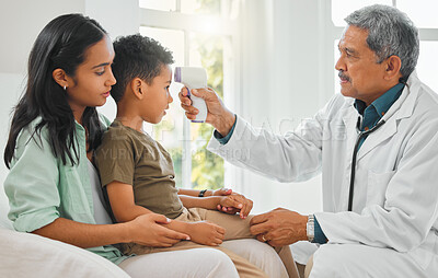 Buy stock photo Pediatrician, woman and child with thermometer, health and vaccine for growth or development in clinic. Mother, boy and doctor for temperature at hospital for symptoms, checkup and illness prevention