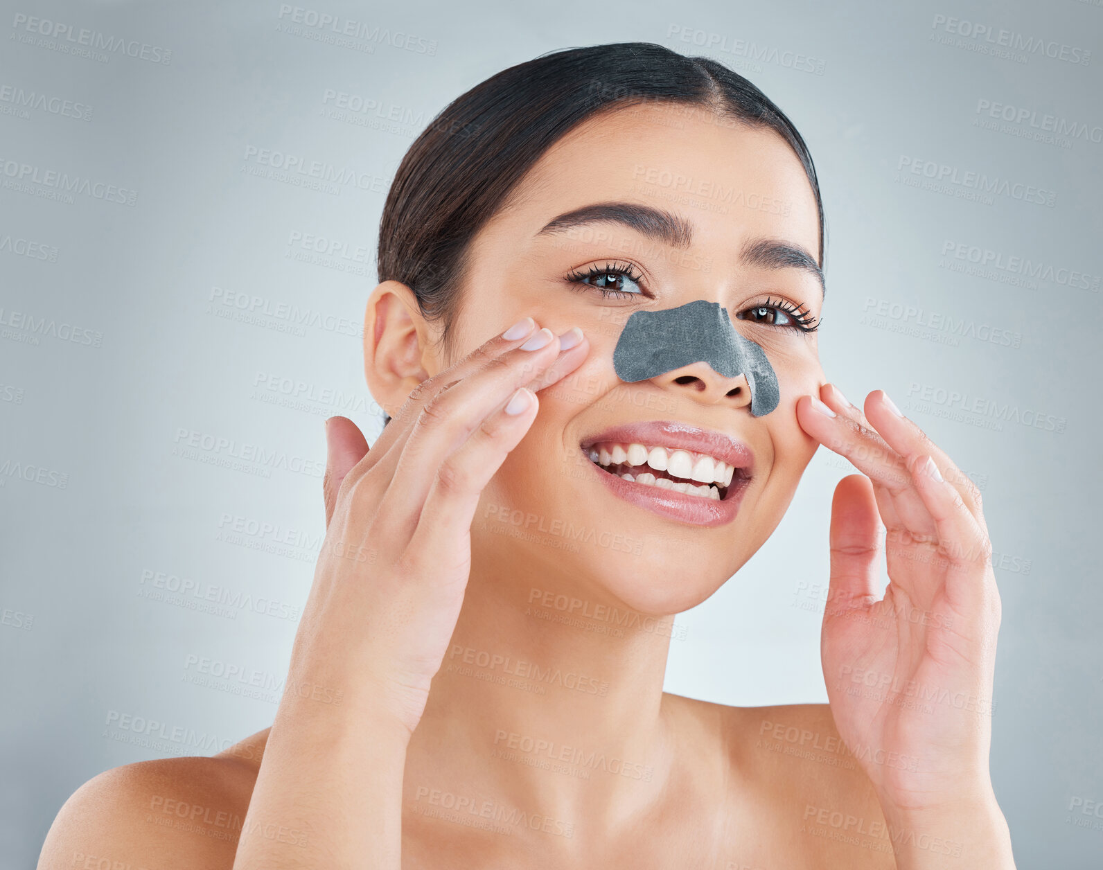 Buy stock photo Woman, nose strip and portrait in studio for skincare, cleansing and pores maintenance for self care and grooming. Facial, blackhead removal and grey background with hand, dermatology and product