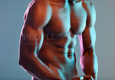 Buy stock photo Shot of an unrecognizable  muscular man posing nude against a grey background