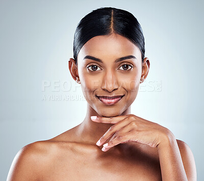Buy stock photo Smile, beauty and portrait of a woman with skincare cosmetic isolated in a studio white background. Clean, Cosmetics and natural female person or model hand on her face happy for self love or care