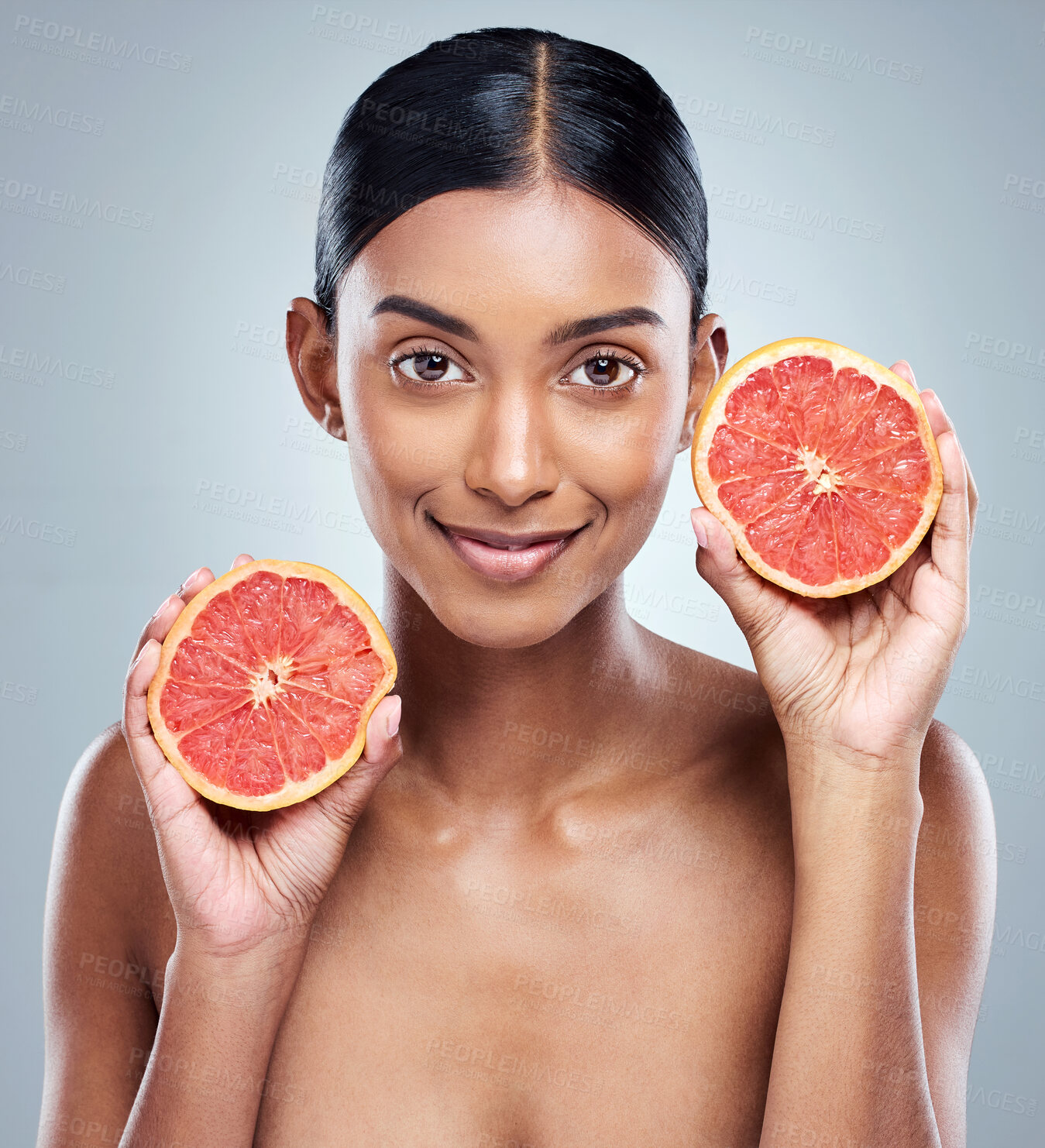 Buy stock photo Skincare, grapefruit and happy woman with portrait in studio for facial treatment, natural or skin glow on white background. Wellness, fruit and model for vitamin C, dermatology or organic cosmetics