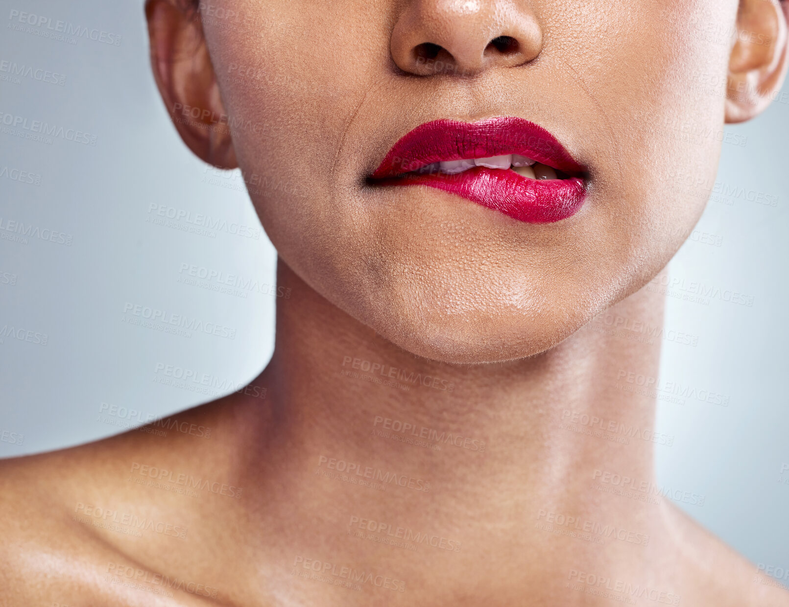 Buy stock photo Closeup shot of an unrecognizable young woman posing in studio against a grey background