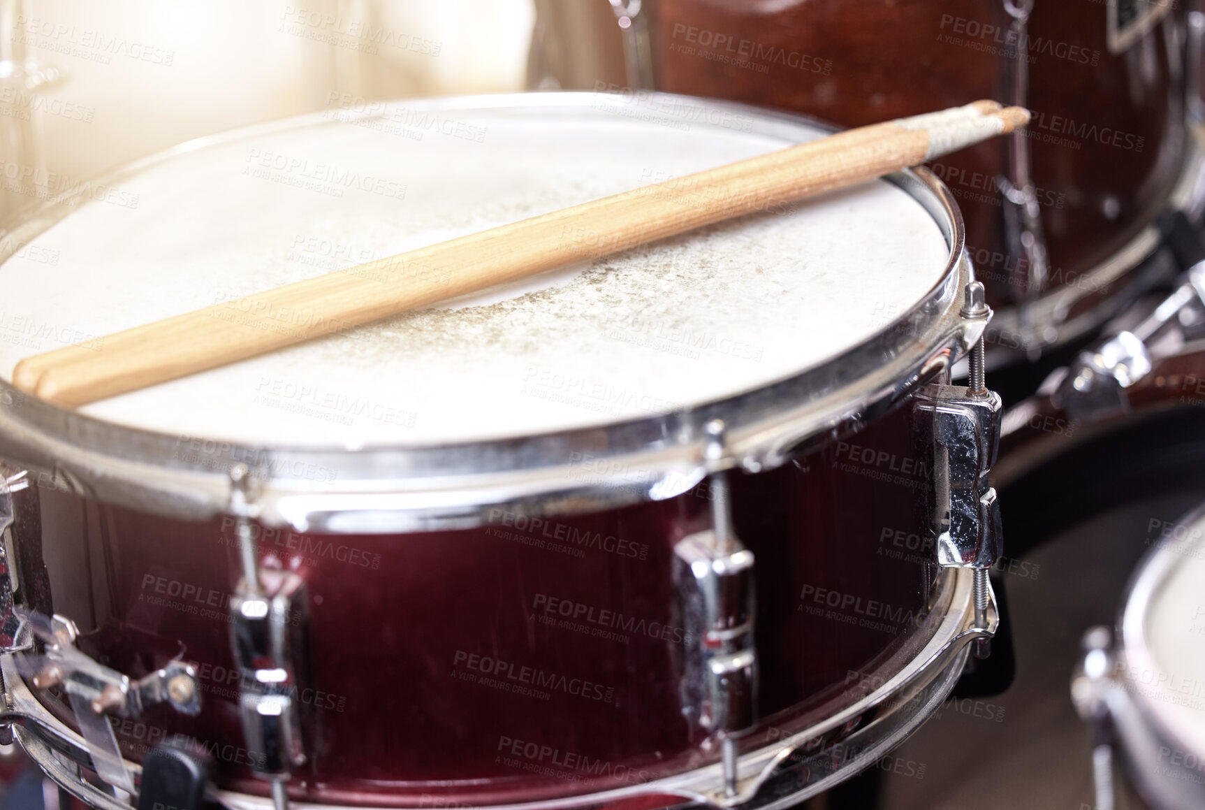 Buy stock photo Closeup, drum and drumsticks in music studio for performance, recording and live show on stage. Percussion, snare and band equipment with instruments at event, party and talent for entertainment