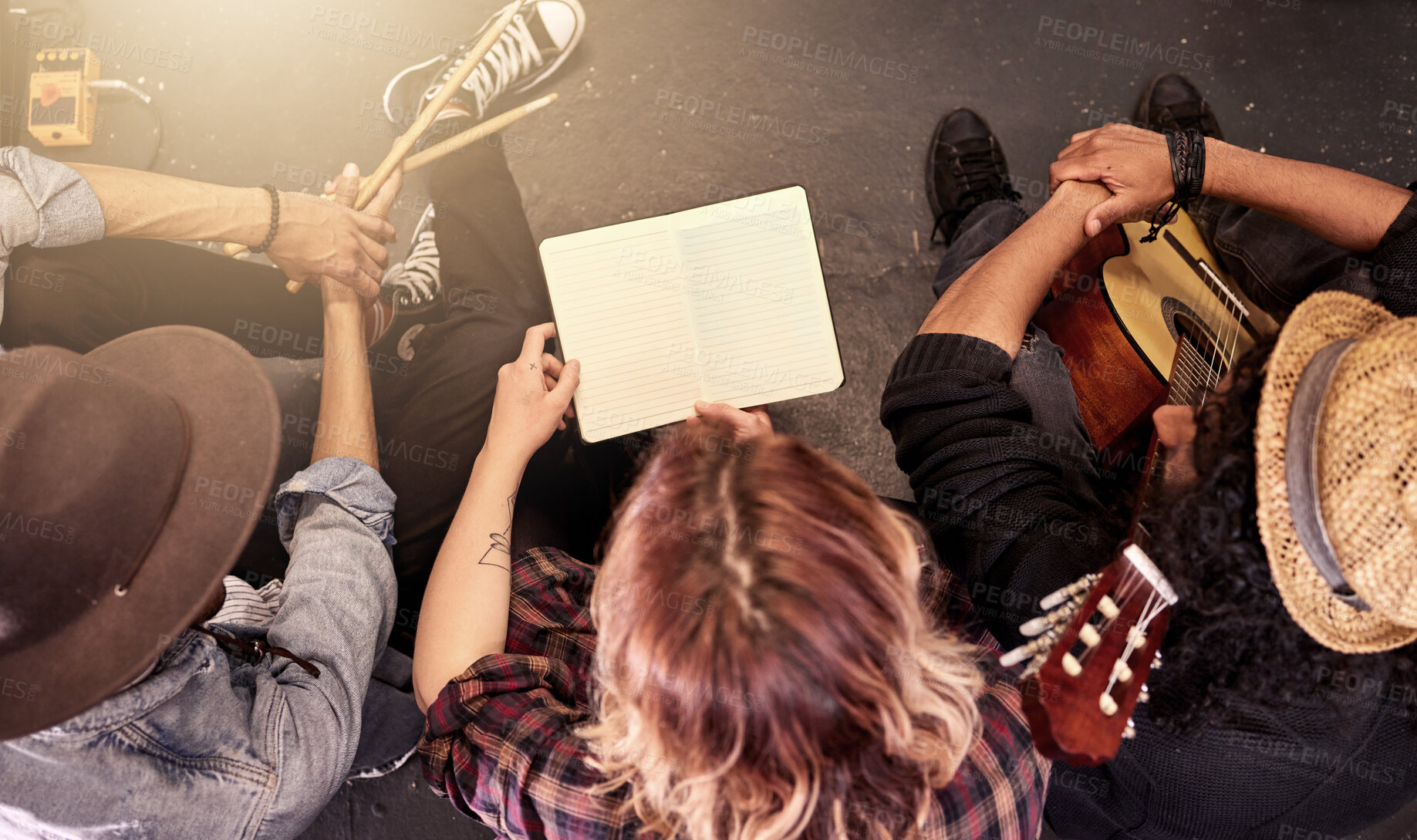 Buy stock photo Band, book and mockup with people backstage together from above for music, practice or performance. Art, concert and event with musician group on floor for discussion or planning of gig and set