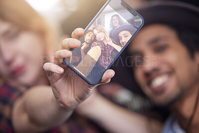 Buy stock photo Hand, phone screen and selfie with friends in band for memory, profile picture or social media post. Art, backstage and photograph with group of young people together for gig, performance or practice