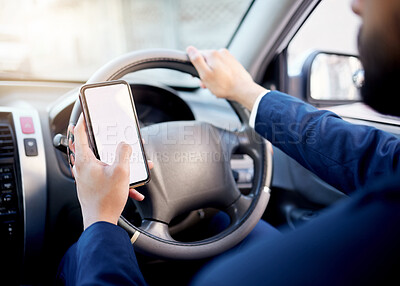 Buy stock photo Closeup shot of an unrecognisable businessman using a cellphone while driving a car