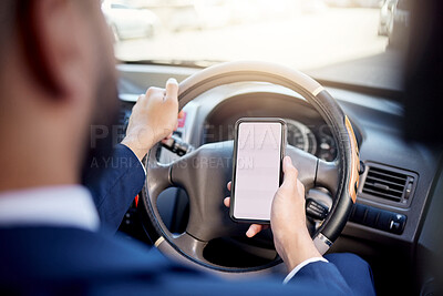 Buy stock photo Closeup shot of an unrecognisable businessman using a cellphone while driving a car