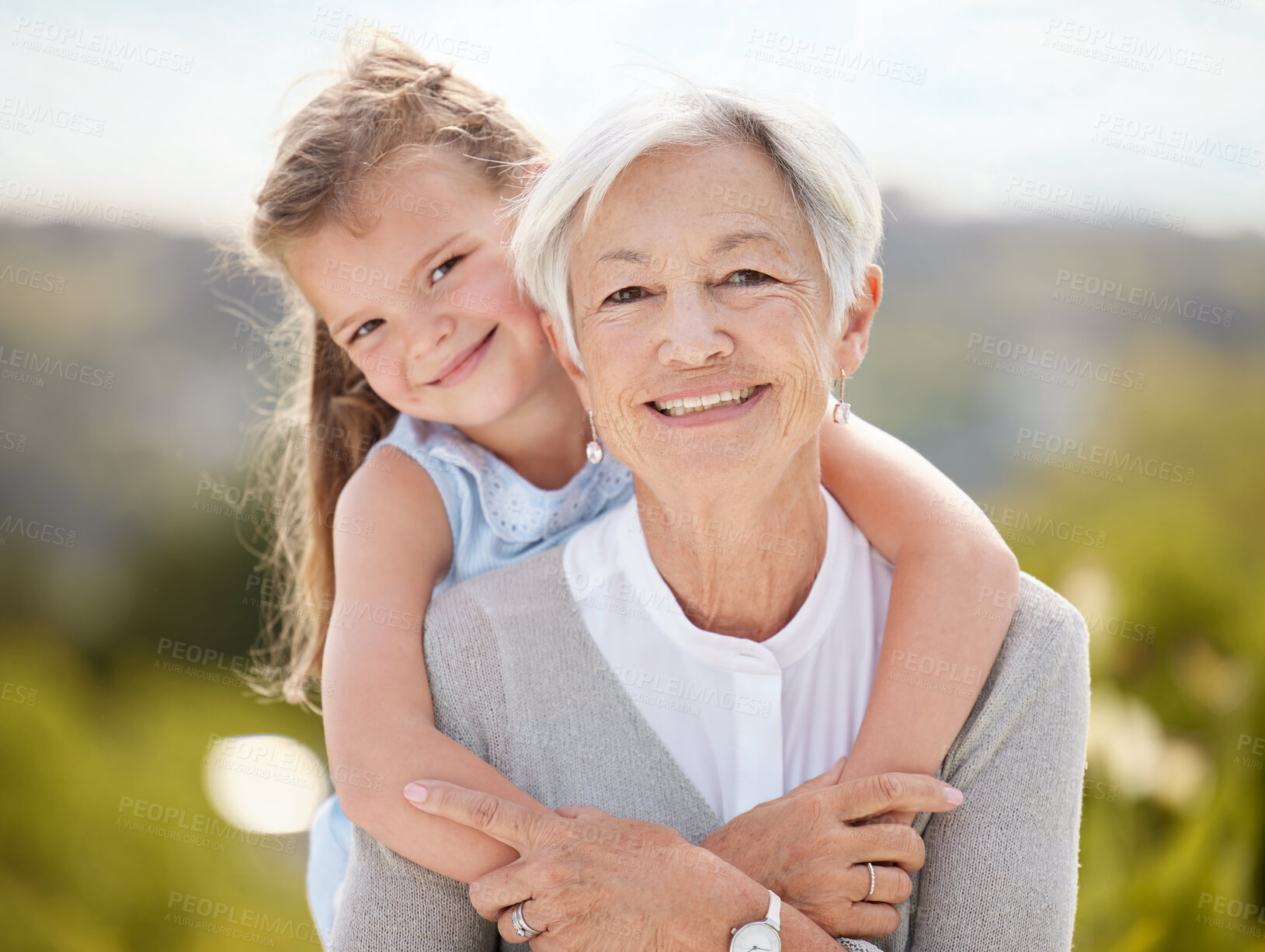 Buy stock photo Hug, park and portrait of child with grandma for bonding, relationship and relax together on weekend. Family, happy and grandmother with young girl outdoors for playing, fun and embrace in nature