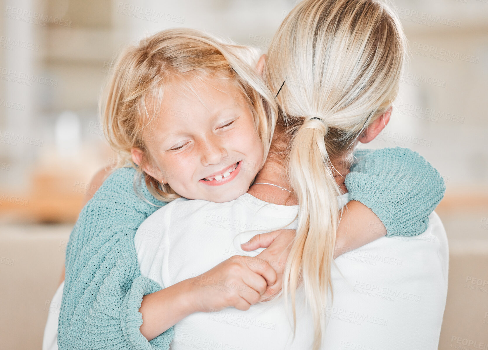 Buy stock photo Smile, kid and hug mom in home for love, care or bonding together on mothers day. Happy girl, child and embrace mama for support, safety or connection with parent for healthy relationship of family