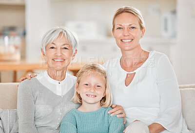 Buy stock photo Cropped portrait of an adorable little girl at home with her mother and grandmother