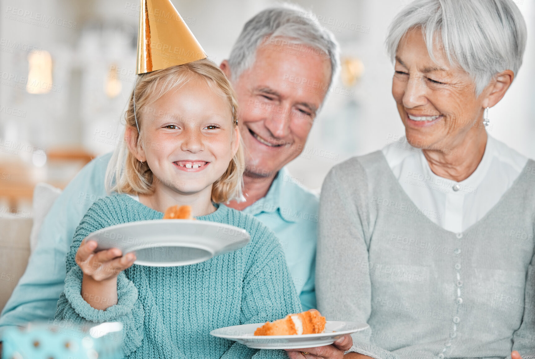 Buy stock photo Grandparents, girl and plate with birthday cake, family or smile for celebration with bonding in home. Eating, child and happy senior grandfather for dessert, party hat or growth with love or grandma