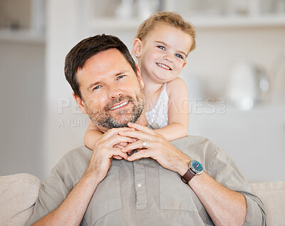 Buy stock photo Shot of a little girl hugging her father at home