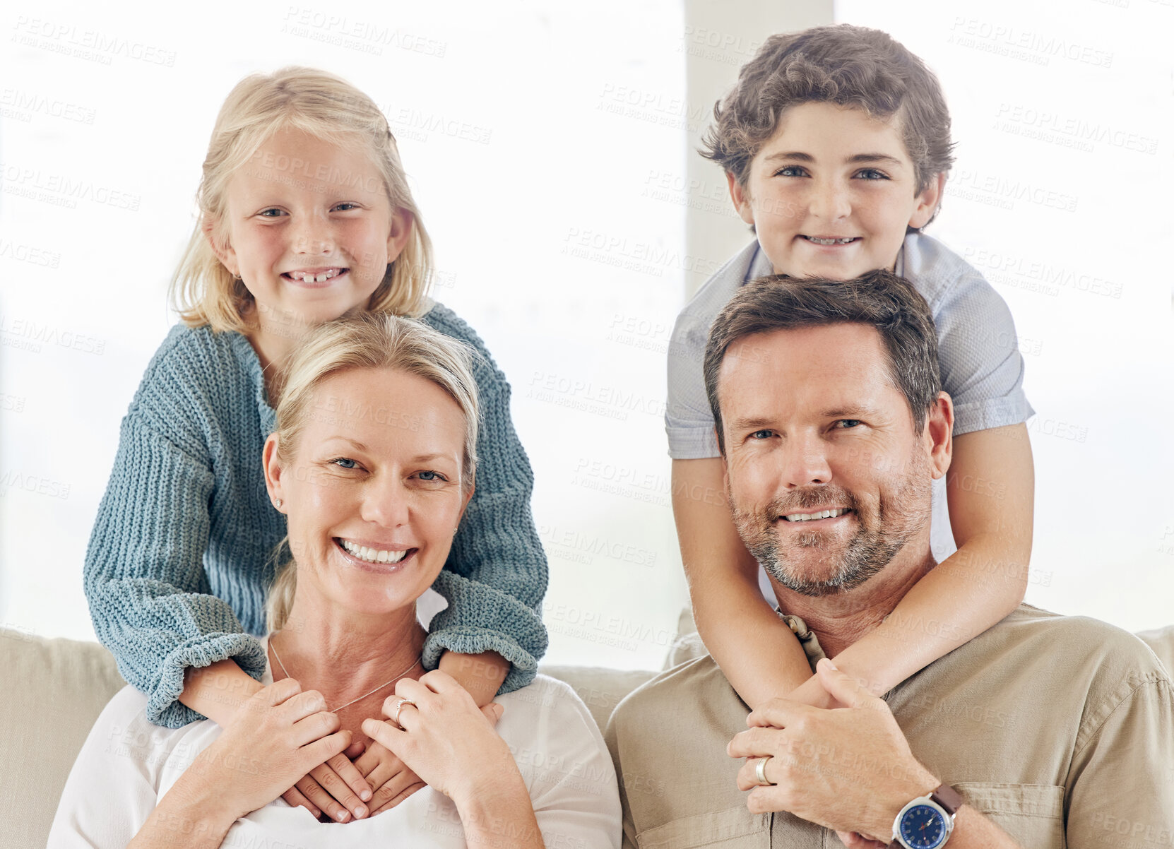 Buy stock photo Family, parents and children in home portrait, dad and mom in hug for bonding on couch. Together, happy father and mother with kids in embrace for love, Berlin and security in connection on sofa