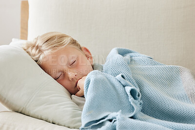 Buy stock photo Shot of an unwell little girl resting on the sofa at home