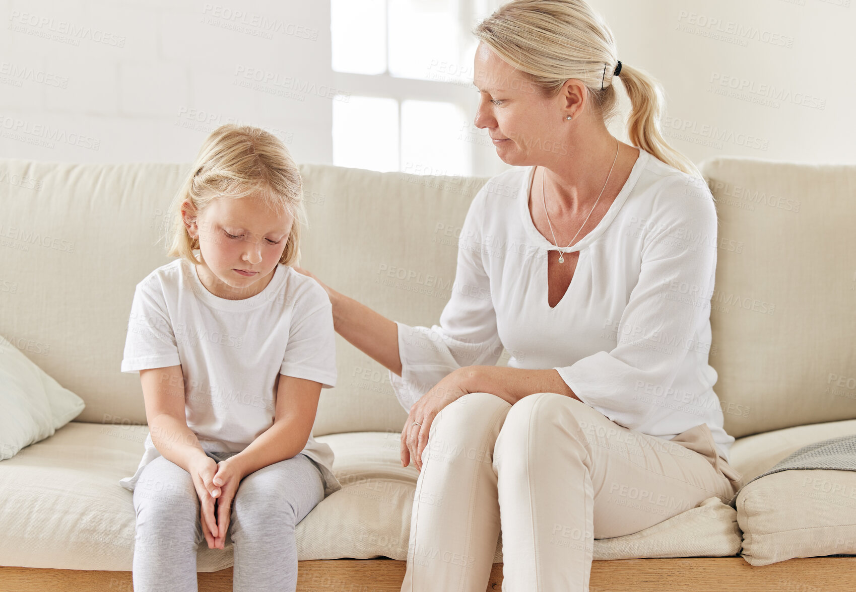 Buy stock photo Sad, support and sympathy with mom with girl kid for bullying, protection and empathy in family home. Comfort, compassion and woman psychologist with child victim for safety, care or help for trauma