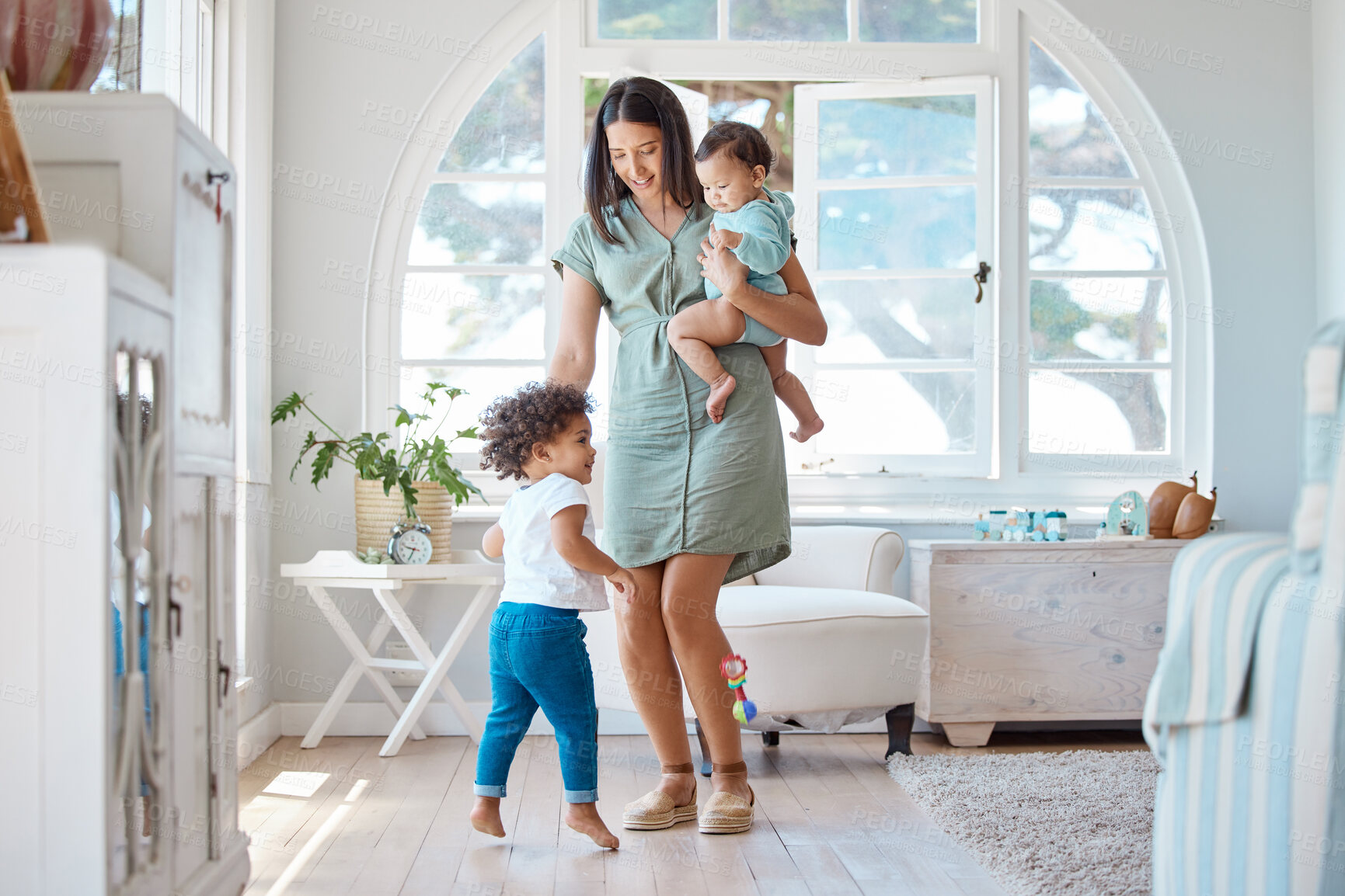 Buy stock photo Mother, baby and dancing with children in home, happy and bonding in morning with love in living room. Mom, kids and infant with care, smile and connection with playing in lounge at family house