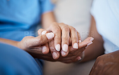 Buy stock photo Cropped shot of an unrecognizable nurse and patient holding hands in comfort