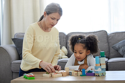 Buy stock photo Shot of a mature child psychologist with her patient