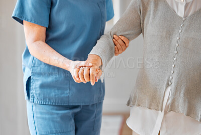 Buy stock photo Closeup shot of a nurse caring for a senior woman in a retirement home